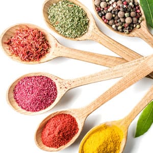 wooden spoons with spices