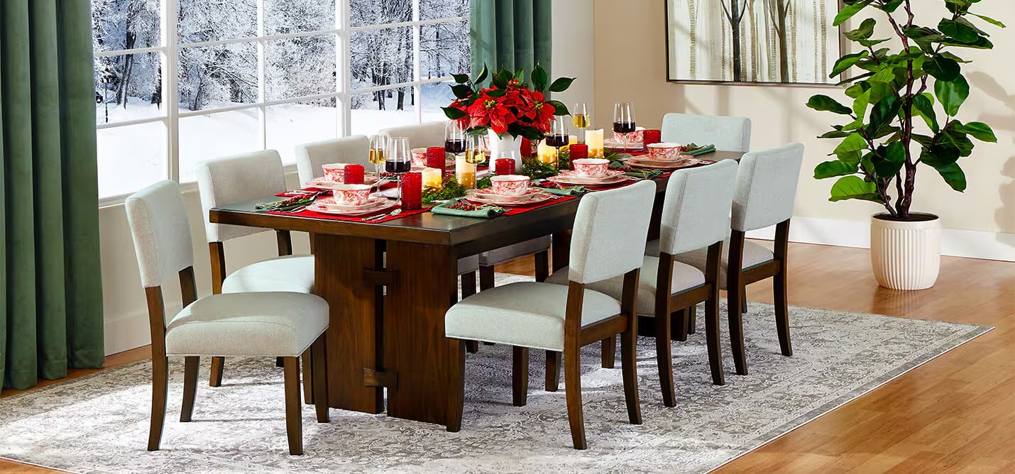 A living room decorated with a variety of Christmas decor