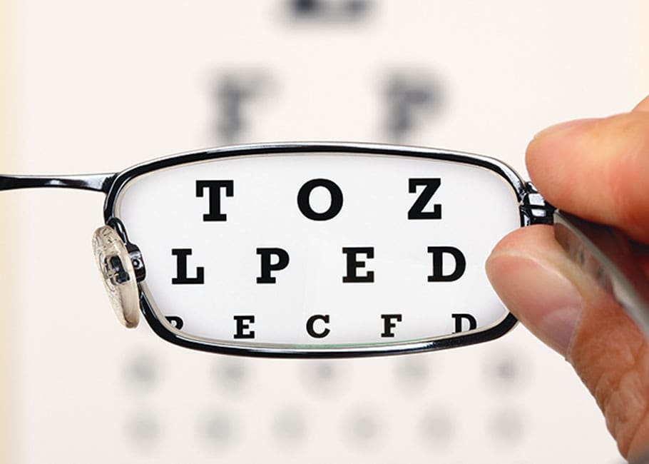 looking through the lens of a pair of glasses