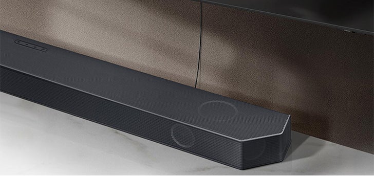 Samsung Q-Series soundbar in black with a metal grille and upward-firing drivers.