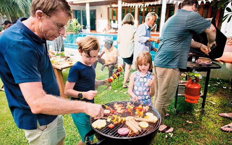 man grilling