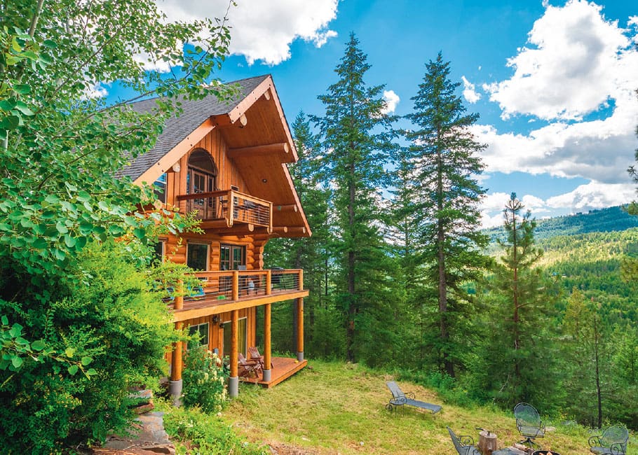 log home in the trees