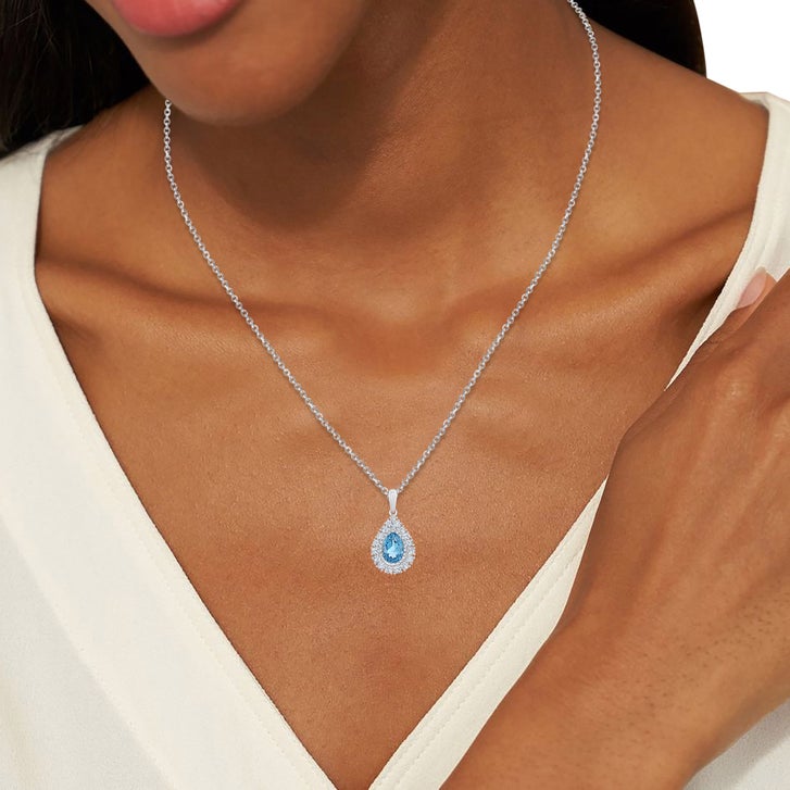 Pear Shaped Swiss Blue Topaz and Diamond Pendant (0.32 ctw) | Costco