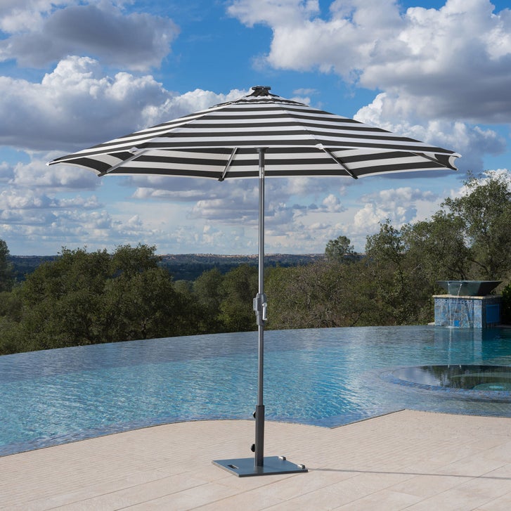 10 ft patio umbrella sunbrella Fabric Deluxe Curvy Umbrella This cantilever umbrella from our Napoli collection provides 100 square feet of relaxing cooling shade 10ft Cantilever Patio Umbrella with