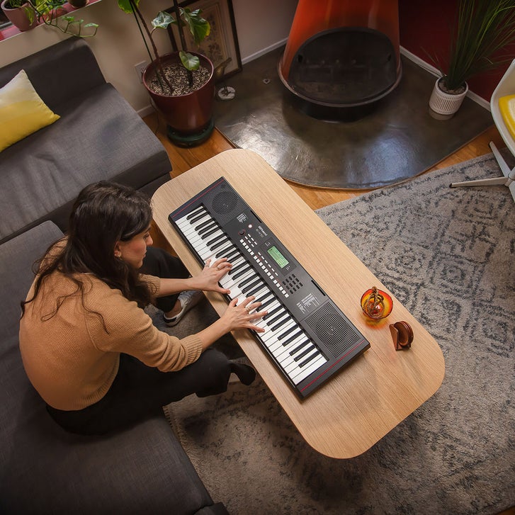 Roland E-X10 Arranger Keyboard with Music Rest and Power Adapter