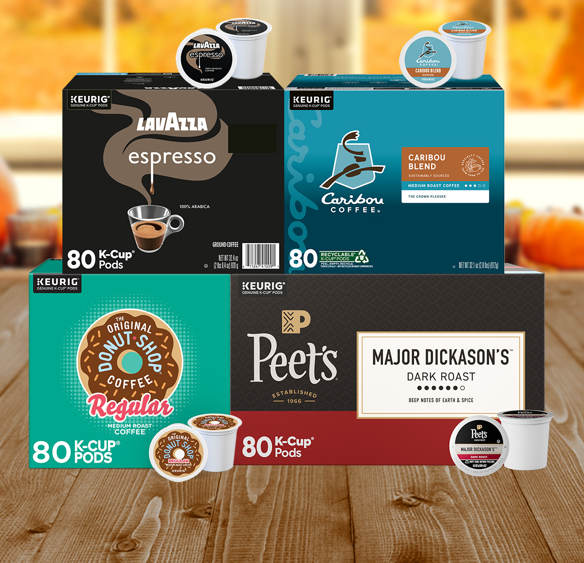 Four k-cup boxes. Lavazza espresso, caribou blend, Donut shop Blend, Peets coffee major dickasons