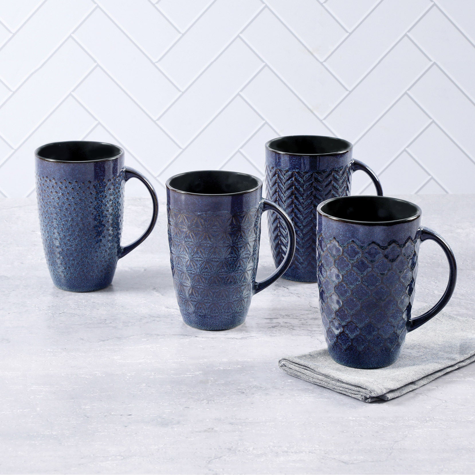 Laurie Gates 4-piece Embossed 22 oz. Mug Set | Costco