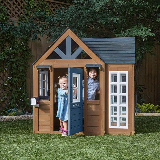 KidKraft Atrium Breeze Wooden Outdoor Playhouse with Sunroom